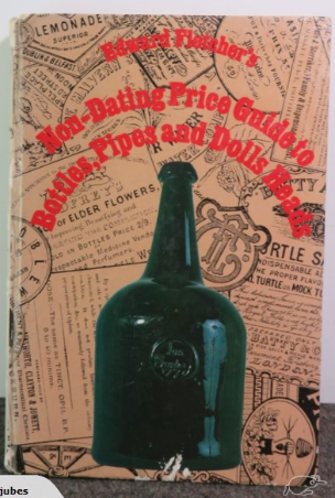 Book cover showing green glass bottle